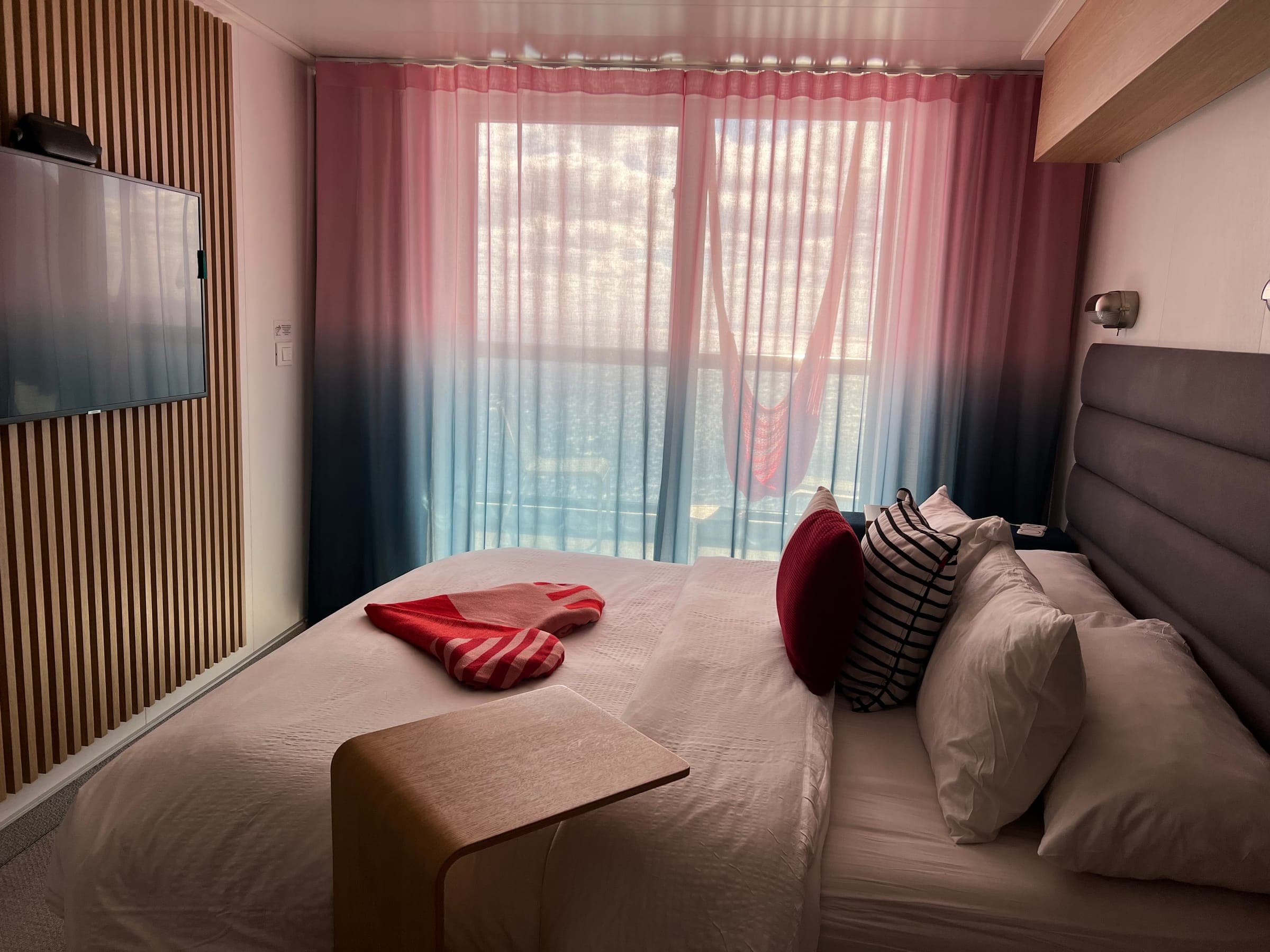 Virgin Voyages cabin interior with ombre curtains