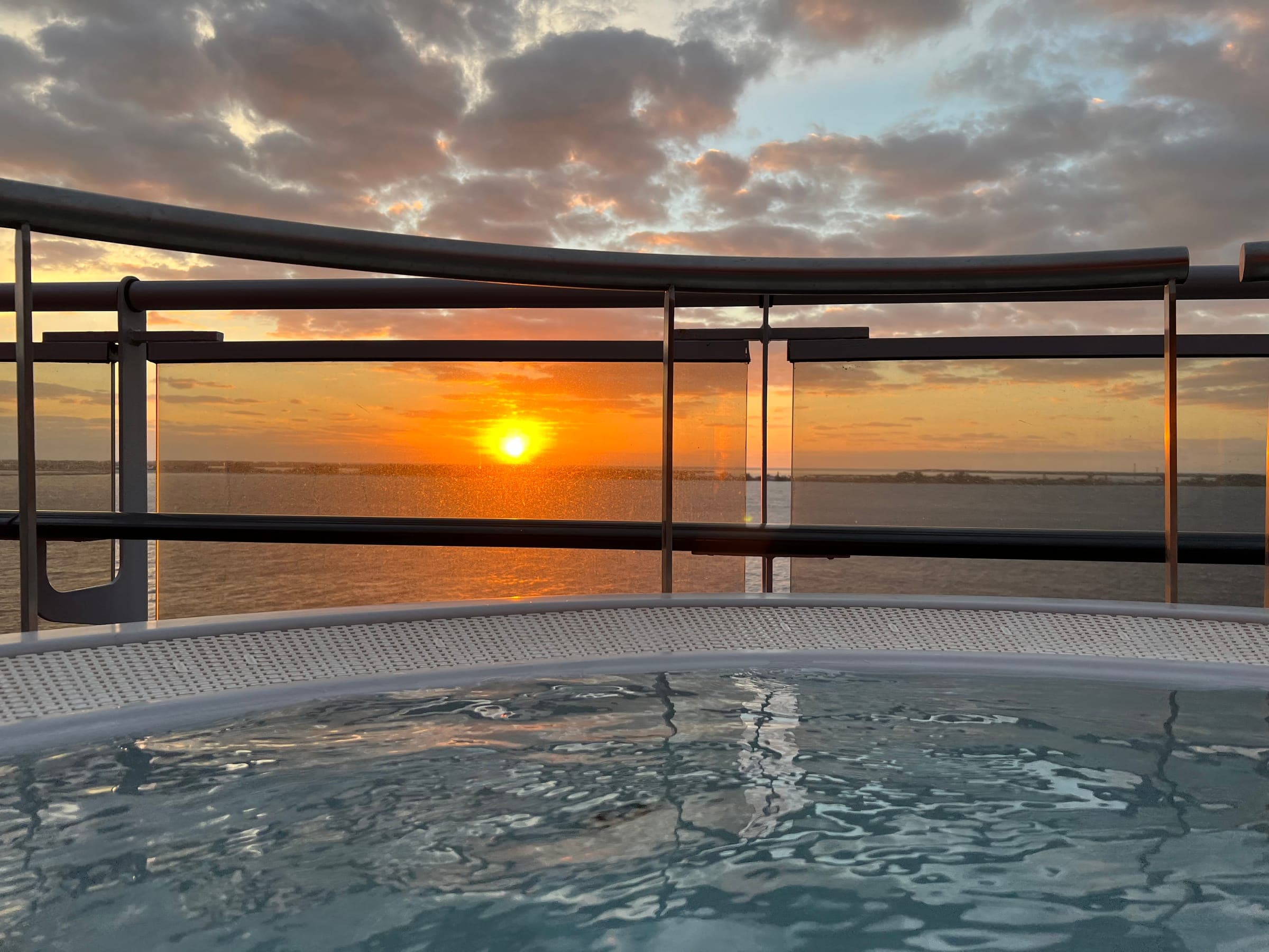 Hot tub on deck at sunset